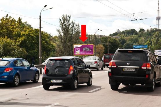 Фото рекламної площини за адресою Телиги ул. / Кирилловская ул. (бывш. Фрунзе ул.), на мосту, в сторону ст. м. "Шулявская"