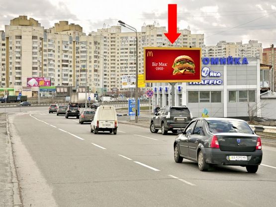 Фото рекламной плоскости по адресу Ревуцкого ул., съезд на Бажана пр., в сторону мост Южный