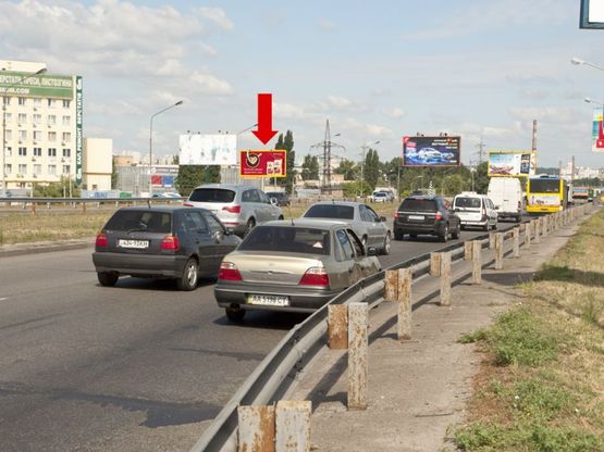 Фото рекламной плоскости по адресу Богатырская ул. / Оболонский пр., заезд с Московского пр.а в сторонуЛуговая ул., ТЦ "Караван" Фото рекламной плоскости по адресу Богатырская ул. / Оболонский пр., заезд с Московского пр.а в сторонуЛуговая ул., ТЦ "Караван"