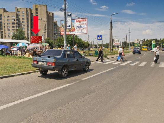 Фото рекламной плоскости по адресу Симиренко ул., 8 / Желудева ул., возле рынка, Универсама, в сторону Курбаса пр.