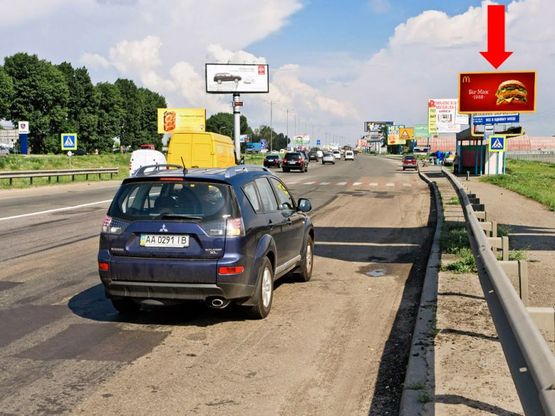 Фото рекламной плоскости по адресу Кольцевая дорога, перед Жулянским мостом над железной дорогой, в сторону Одесская пл.