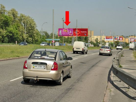 Фото рекламной плоскости по адресу Заболотного ул. / Коммунальная ул., разделитель, левая, в сторону ТРЦ "ART Mall", Столичное шоссе