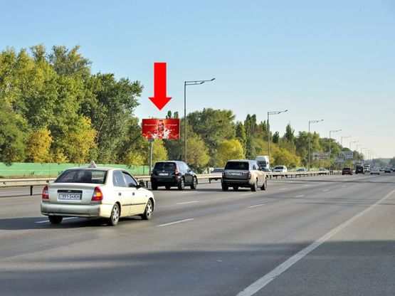 Фото рекламной плоскости по адресу Столичное шоссе, возле заезда на насосную станцию "Мышеловская", разделитель, в сторону Науки пр.