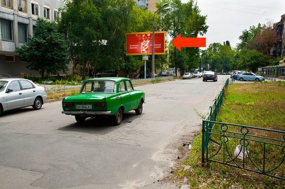 Фото рекламной плоскости по адресу Шпака ул., 2, зеленая зона, в сторону Победы пр.