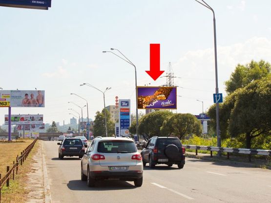 Фото рекламної площини за адресою Оболонский пр., возле АЗС "ТНК", в сторону ст. м. "Почайна" (бывш. ст. м. "Петровка")