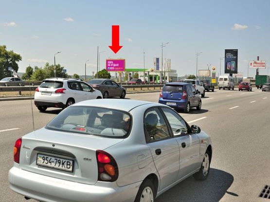 Фото рекламной плоскости по адресу Бажана пр., перед въездом на мост Южный, возле АЗС "Amic" Фото рекламной плоскости по адресу Бажана пр., перед въездом на мост Южный, возле АЗС "Amic"