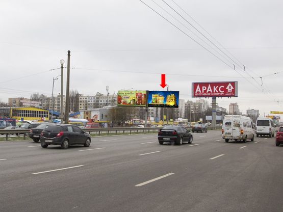 Фото рекламной плоскости по адресу Кольцевая дорога, разделитель, напротив супермаркетов "Ашан", "Эльдорадо", в сторону Теремков, правая