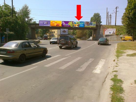 Фото рекламной плоскости по адресу Липинского ул. / Клепаровская ул. / Ерошенко ул., возле пивзавода "Львовское", ж/д мост, правый