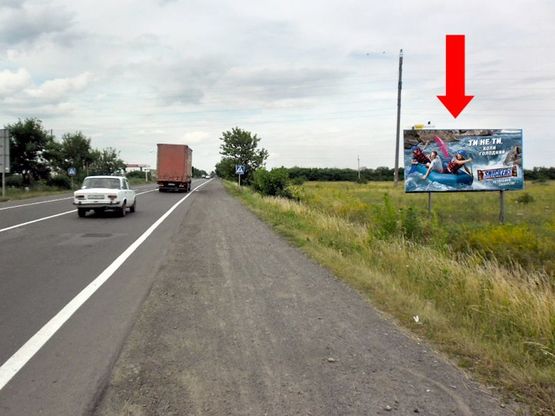 Фото рекламної площини за адресою Объездная трасса Киев - Ужгород, возле авторынка "Кинчеш"