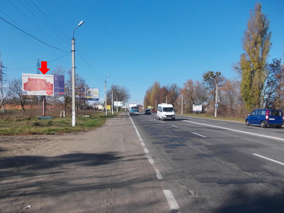 Фото рекламной плоскости по адресу Винницкое шоссе, возле магазина "Лезнево", въезд в город Фото рекламной плоскости по адресу Винницкое шоссе, возле магазина "Лезнево", въезд в город