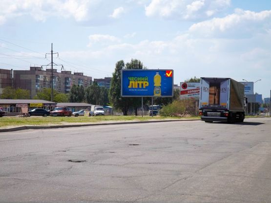 Фото рекламной плоскости по адресу Донецьке шосе, за ринком "Березинський", в центр Фото рекламной плоскости по адресу Донецьке шосе, за ринком "Березинський", в центр