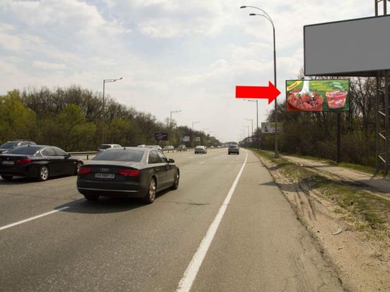 Фото рекламної площини за адресою Столичное шоссе - пер. Охотский, в сторону ТРЦ "Атмосфера", супермаркета "Фоззи", из центра