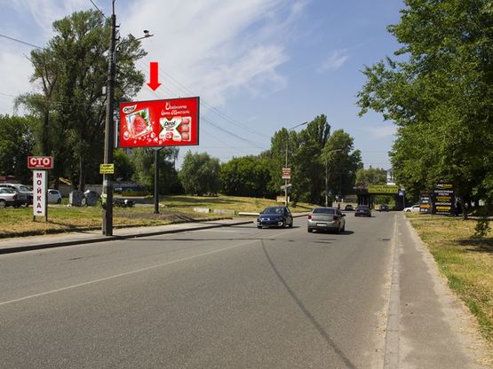 Фото рекламной плоскости по адресу Отрадный пр., 107, из центра