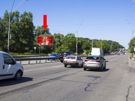 Фото рекламної площини за адресою Победы пр. - ул. Ушакова, напротив, из центра