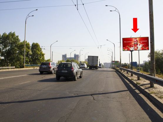 Фото рекламної площини за адресою Полярная ул., перед мостом, в сторону супермаркета "Эпицентр", ул. Богатырской