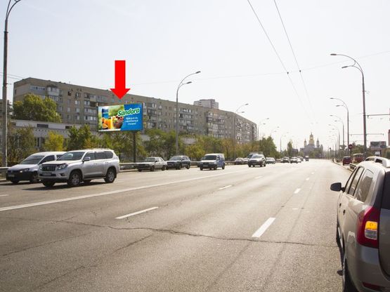 Фото рекламної площини за адресою Малиновского ул., 9, возле супермаркета "Сильпо", в сторону ст.м. "Оболонь"