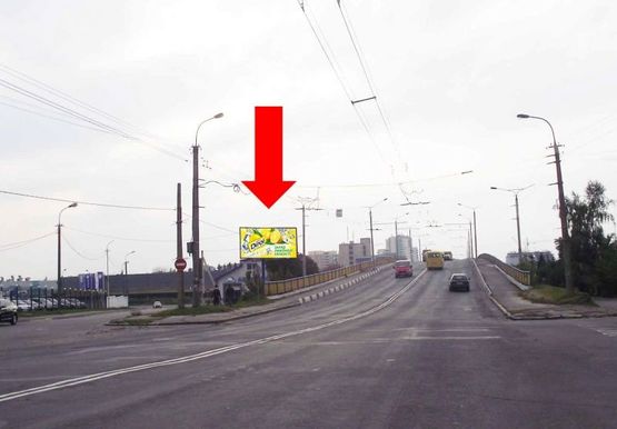 Фото рекламной плоскости по адресу Ровенская ул., возле автомагазина "АТЛ", мост, в центр Фото рекламной плоскости по адресу Ровенская ул., возле автомагазина "АТЛ", мост, в центр