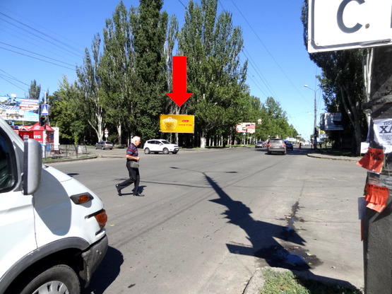 Фото рекламной плоскости по адресу Мира пр. / Театральная ул. (бывш. Васляева ул.), возле Приватбанка, супермаркета "Novus", в центр