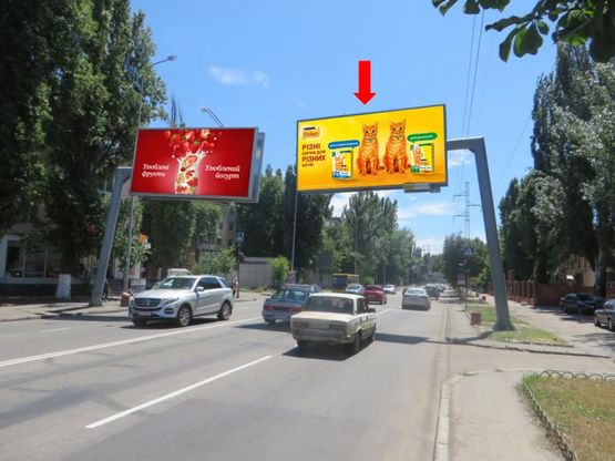 Фото рекламной плоскости по адресу Краснова ул., 3, возле банка "Пивденный", из центра