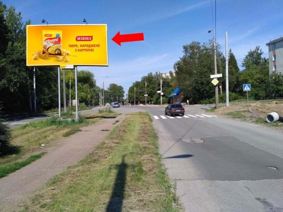 Фото рекламной плоскости по адресу Бережанская ул. / Троллейбусная ул., разделитель, в центр