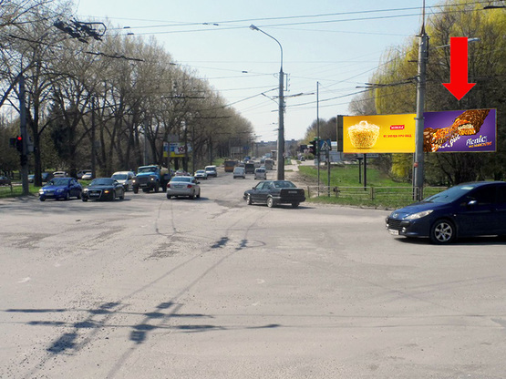 Фото рекламной плоскости по адресу Злуки пр. / 15-го Апреля ул., возле ТЦ "Мандарин", супермаркета "Сильпо", в центр, правая Фото рекламной плоскости по адресу Злуки пр. / 15-го Апреля ул., возле ТЦ "Мандарин", супермаркета "Сильпо", в центр, правая