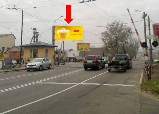 Фото рекламної площини за адресою Привокзальная ул. (бывш. Луначарского ул.) / Ласточкина ул. (бывш. Чапаева ул.), в сторону Набережной магистрали