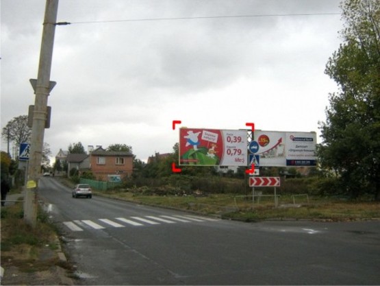 Фото рекламной плоскости по адресу вул. Проскурівського підпілля, зліва Фото рекламной плоскости по адресу вул. Проскурівського підпілля, зліва