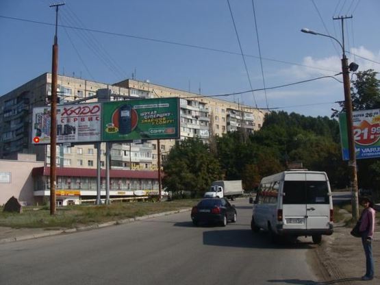 Фото рекламної площини за адресою Паникахи ул, Торговый центр Тополек, рынок, в центр, левый Фото рекламної площини за адресою Паникахи ул, Торговый центр Тополек, рынок, в центр, левый