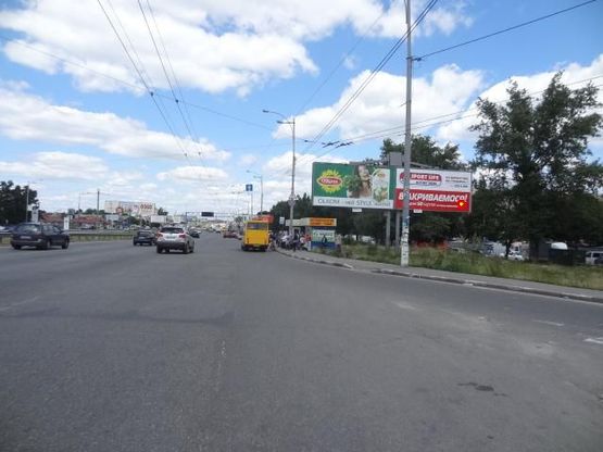 Фото рекламной плоскости по адресу Зодчих ул. / Кольцевая дорога, возле продуктового и оптового рынка, правый Фото рекламной плоскости по адресу Зодчих ул. / Кольцевая дорога, возле продуктового и оптового рынка, правый