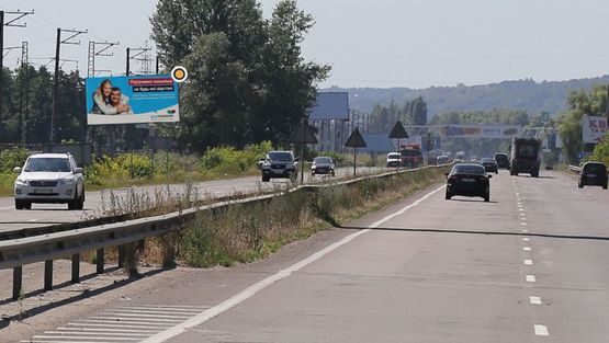 Фото рекламной плоскости по адресу Новообуховская трасса, 22+000 слева, 70 м. до растяжки над шоссе Б Фото рекламной плоскости по адресу Новообуховская трасса, 22+000 слева, 70 м. до растяжки над шоссе Б