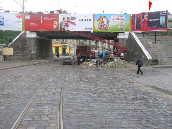 Фото рекламної площини за адресою Замарстынивская ул, возле моста, ст А, от центра Фото рекламної площини за адресою Замарстынивская ул, возле моста, ст А, от центра